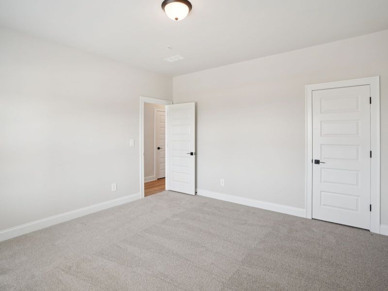 Spacious, unfurnished interior of a new home in Martin Springs - Highland Series, Lawrenceville (Image 21).