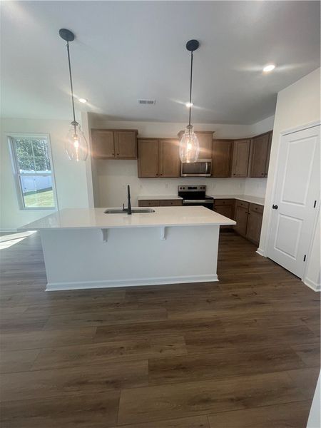 Furnished interior view inside a new home in Springwood Grove, Central (Image 3).
