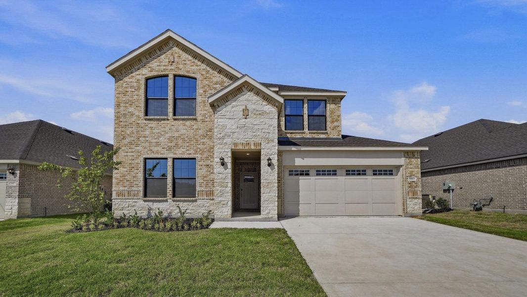 Representative exterior photo of a completed home built from the Tangerine by D.R. Horton in Windchime, Celina, TX (Image 1). Representative exterior photo of a completed home built from the Tangerine by D.R. Horton in Windchime, Celina, TX (Image 1).