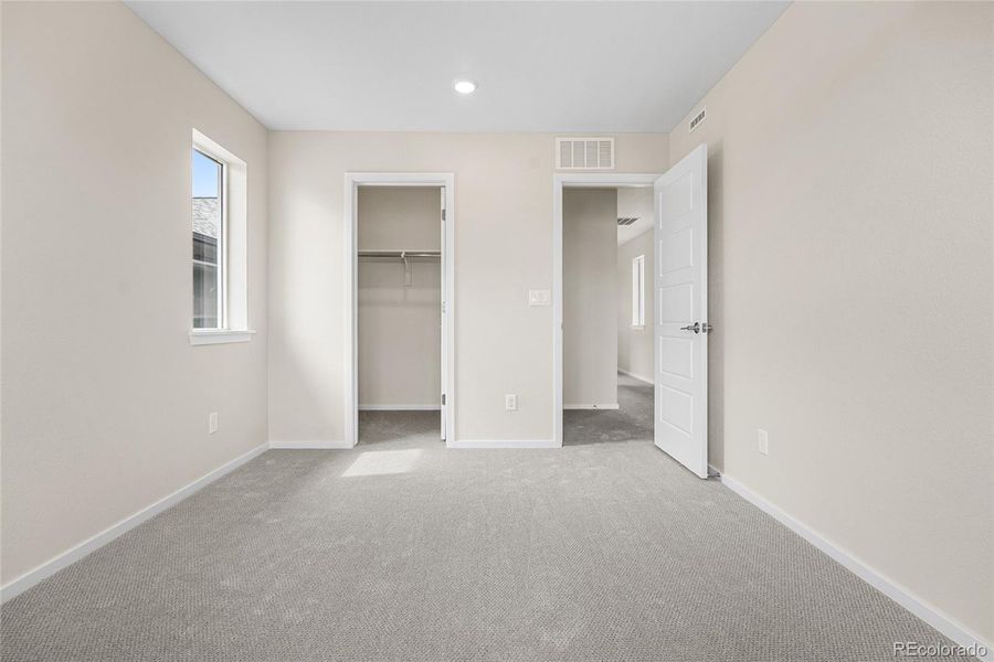 Spacious, unfurnished interior of a new home in Barefoot Village, Firestone (Image 30).