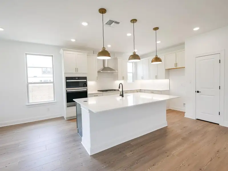 Furnished interior view inside a new home in Bluffview Reserve, Leander (Image 3). Furnished interior view inside a new home in Bluffview Reserve, Leander (Image 3).