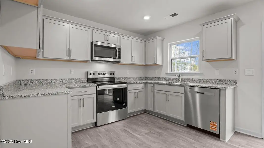 Furnished interior view inside a new home in Jetstream Park, Wilson (Image 5).