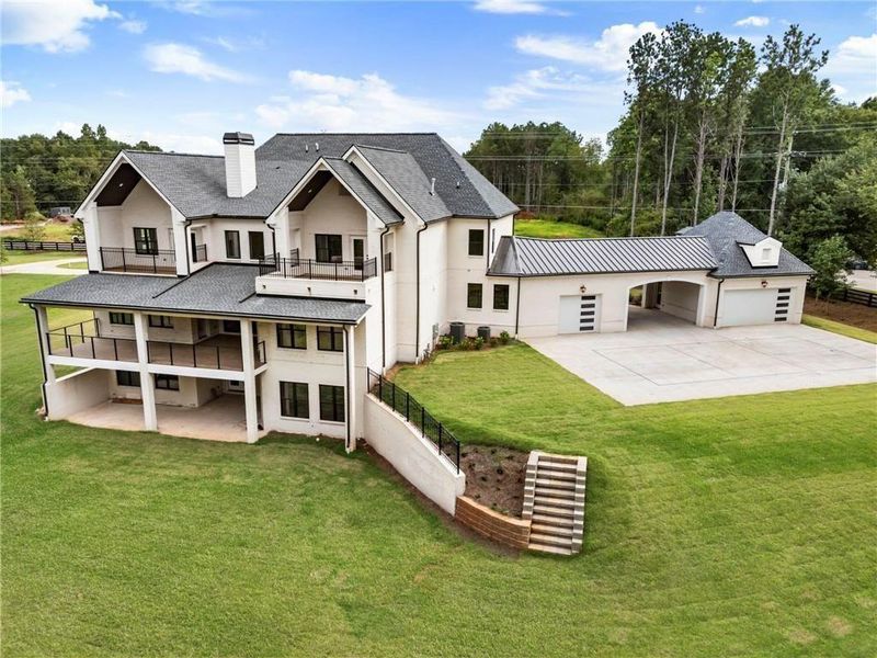 Front exterior of a new home in , Milton, GA, highlighting curb appeal (Image 26). Front exterior of a new home in , Milton, GA, highlighting curb appeal (Image 26).