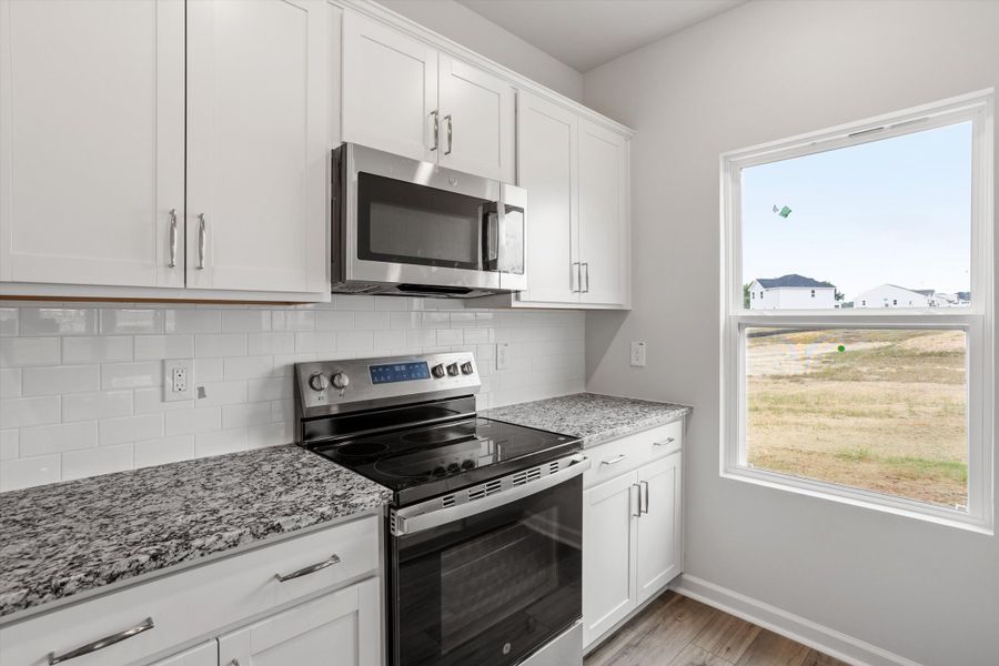 Furnished interior view inside a new home in Cambridge Reserve, Angier (Image 11).