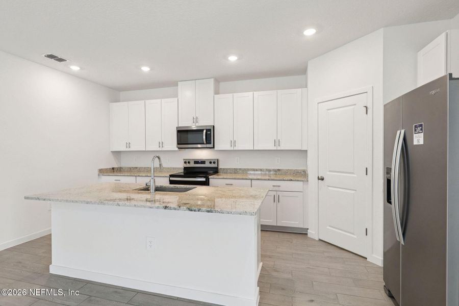 Furnished interior view inside a new home in Cypress Meadows - Signature Series, Jacksonville (Image 9).