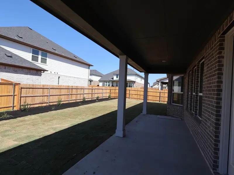 Exterior details and patio area of a home in Edgewood, Leander (Image 2). Exterior details and patio area of a home in Edgewood, Leander (Image 2).