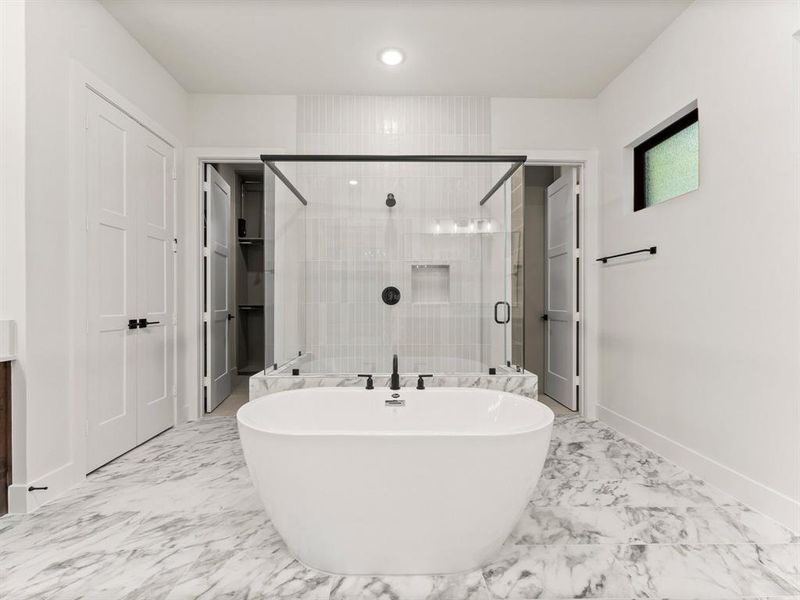 Freestanding Tub, Separate Shower, and Generous Linen Closet at Primary Bathroom