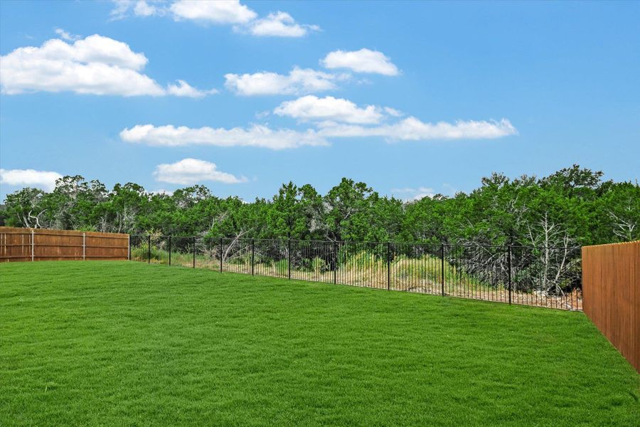 Exterior details and patio area of a home in Riverstone, Georgetown (Image 19).
