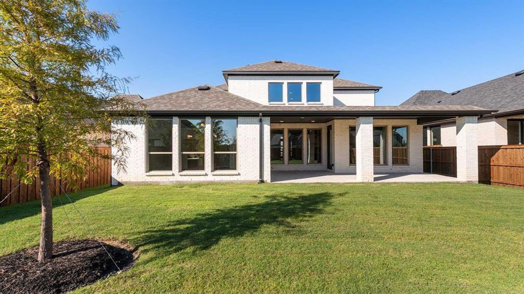 Exterior details and patio area of a home in Trinity Falls 50', McKinney (Image 3).