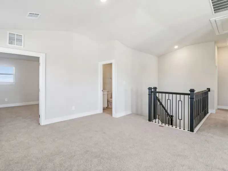 Spacious, unfurnished interior of a new home in Legendary Trails - Premier Series, Cibolo (Image 29).