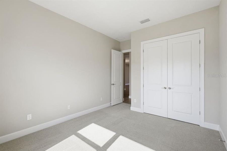 Spacious, unfurnished interior of a new home in Esplanade at Westview, Kissimmee (Image 20).