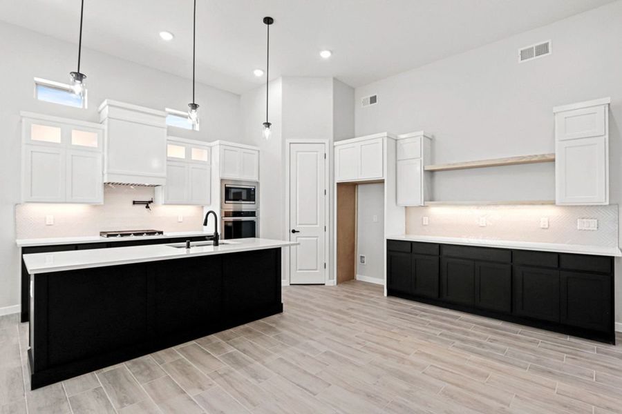 Furnished interior view inside a new home in Garden Park Unit 4, El Paso (Image 12).