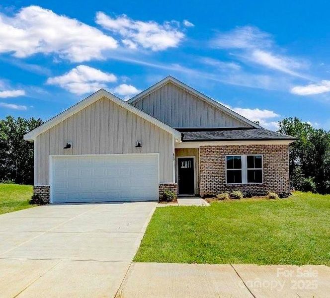 Front exterior of a new home in , Kannapolis, NC, highlighting curb appeal (Image 1).