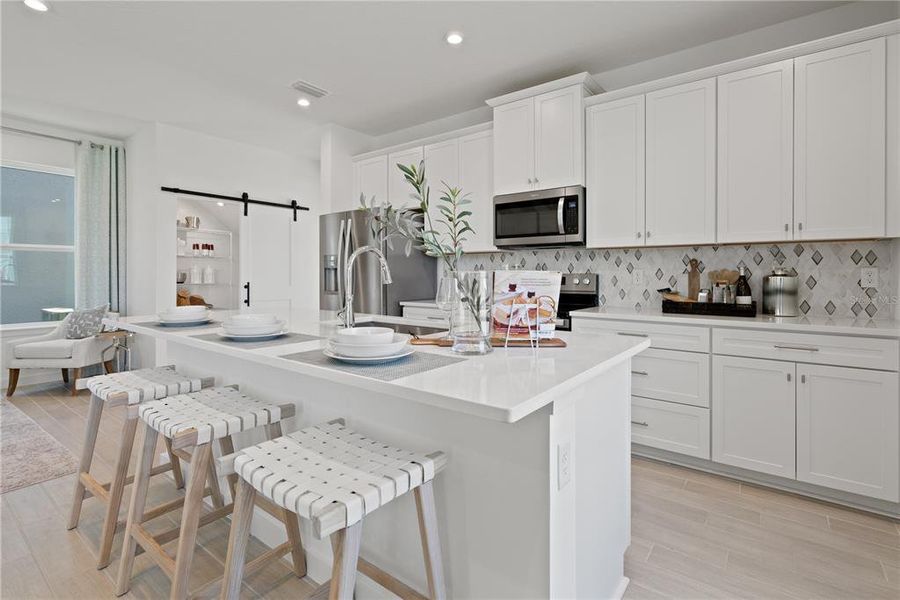 Furnished interior view inside a new home in Trinity Place, St. Cloud (Image 7). Furnished interior view inside a new home in Trinity Place, St. Cloud (Image 7).