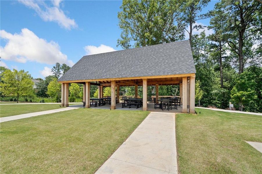 Front exterior of a new home in , Woodstock, GA, highlighting curb appeal (Image 31). Front exterior of a new home in , Woodstock, GA, highlighting curb appeal (Image 31).