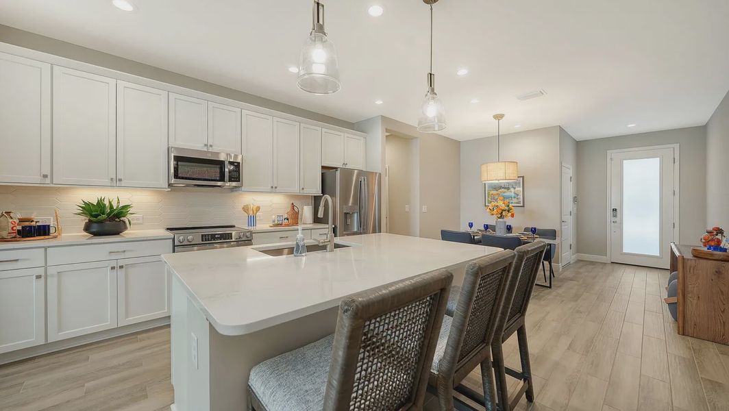 Representative furnished interior of a home built from the Avery by Neal Communities in SkySail, Naples (Image 26).