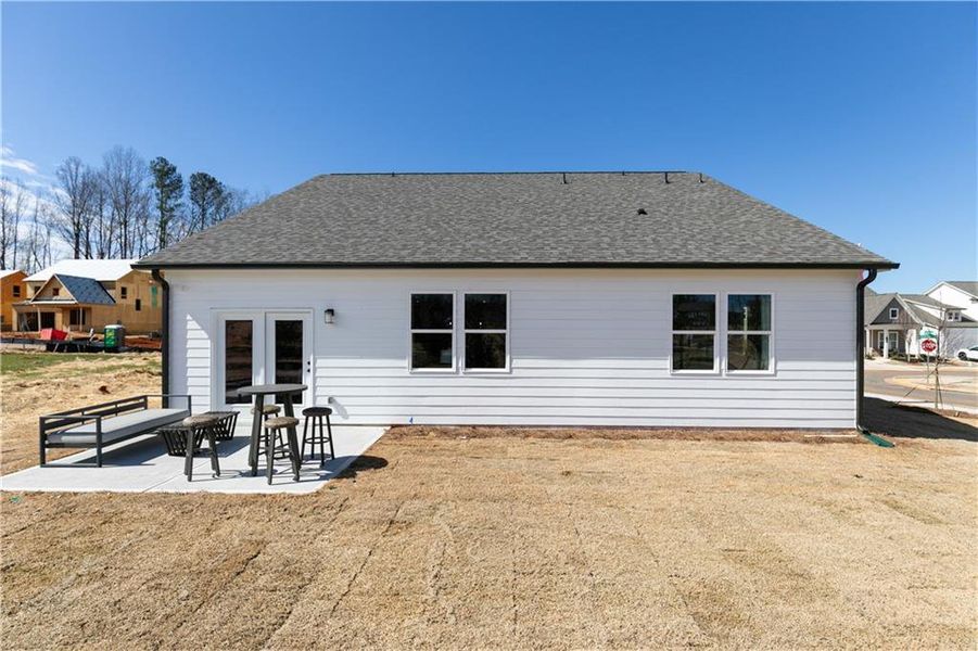 Exterior details and patio area of a home in Madison at Buice Lake, Acworth (Image 21).