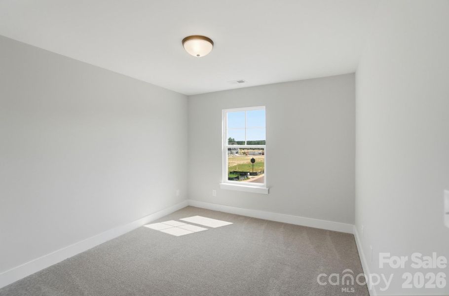Spacious, unfurnished interior of a new home in Blythe Mill Townhomes, Waxhaw (Image 42).