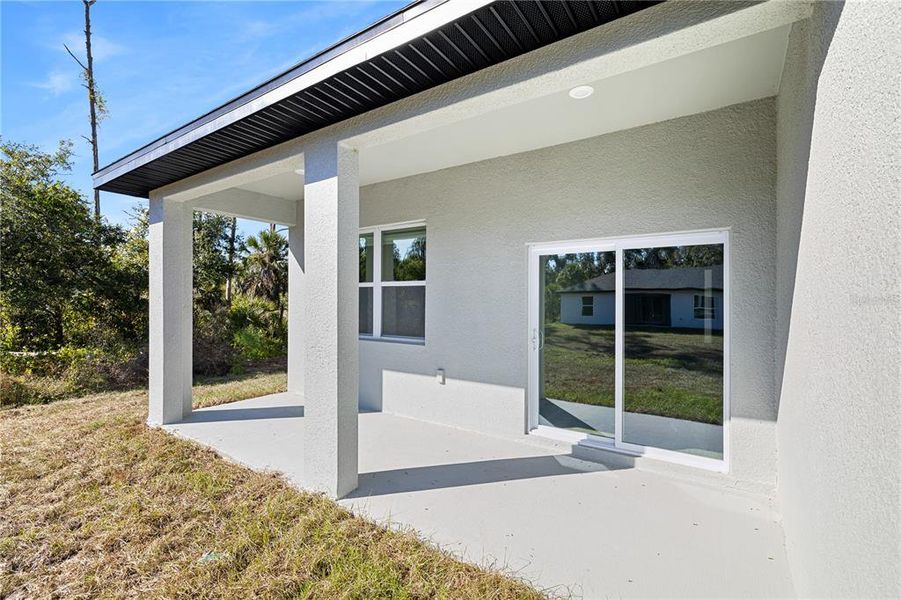 Exterior details and patio area of a home in , Port Charlotte (Image 27).