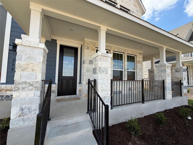 Exterior details and patio area of a home in Lariat, Liberty Hill (Image 4).