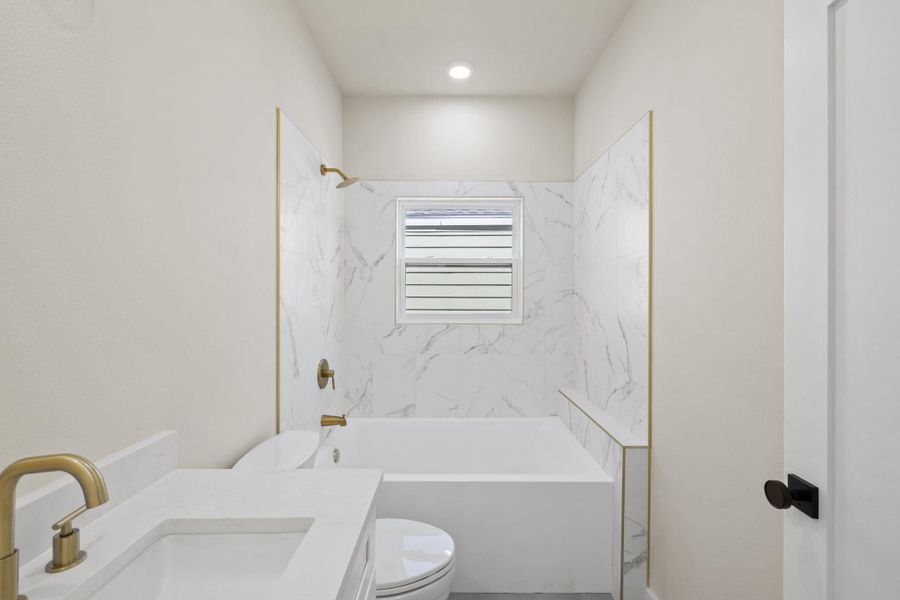 Full bathroom with shower / tub combination and vanity Full bathroom with shower / tub combination and vanity