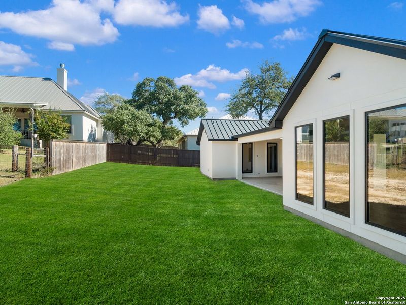 Exterior details and patio area of a home in , Boerne (Image 35).