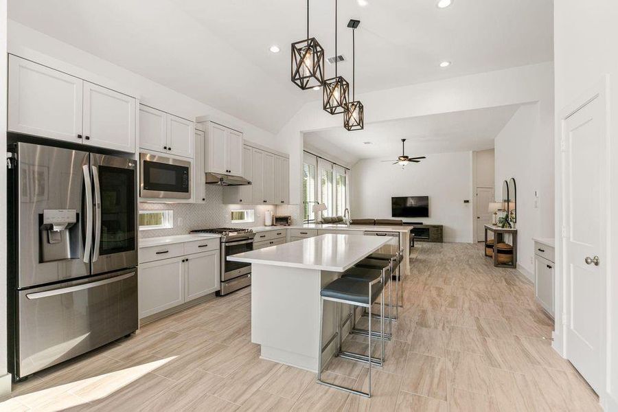 Enjoy open-concept living! The casualdining space offers a clear, inviting viewdirectly into the stunning, modernkitchen. Enjoy open-concept living! The casualdining space offers a clear, inviting viewdirectly into the stunning, modernkitchen.