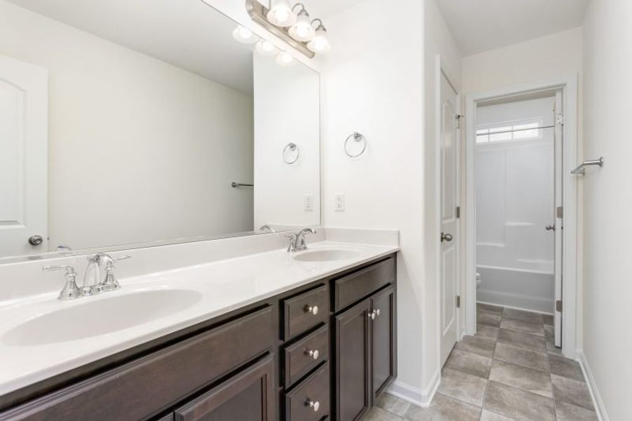 Furnished interior view inside a new home in Avondale, Greensboro (Image 10). Furnished interior view inside a new home in Avondale, Greensboro (Image 10).