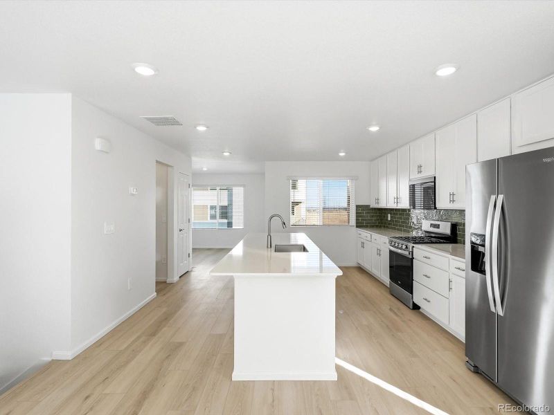 Furnished interior view inside a new home in Three Hills, Morrison (Image 6). Furnished interior view inside a new home in Three Hills, Morrison (Image 6).