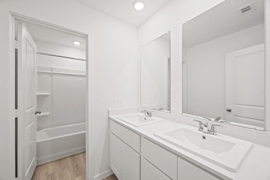 Furnished interior view inside a new home in Lexington Heights, Willis (Image 4).