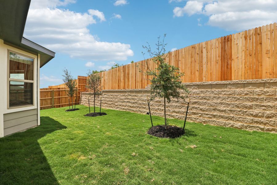 Back exterior of the Hughes floorplan at a Meritage Homes community.