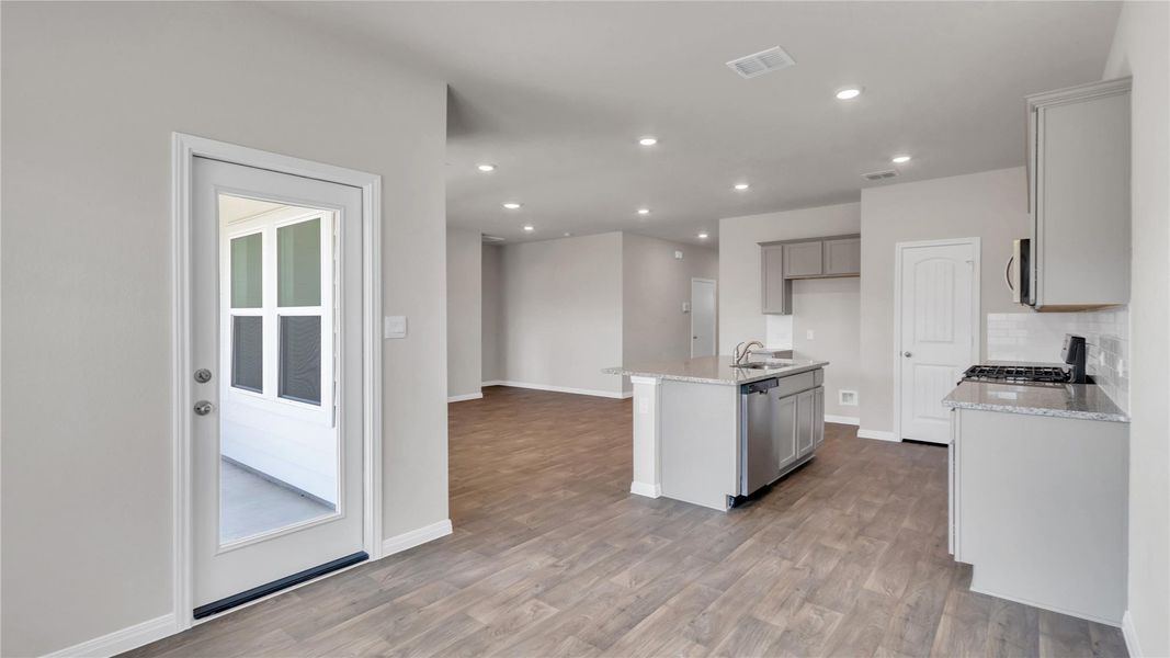 Furnished interior view inside a new home in Carillon, Manor (Image 7).
