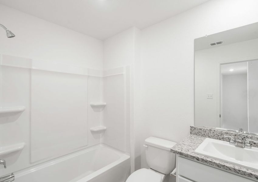 Bathroom with a shower/tub combination
