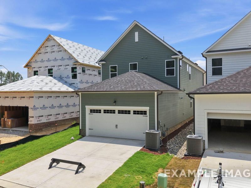 Front exterior of a new home in Forestville Yard, Knightdale, NC, highlighting curb appeal (Image 2). Front exterior of a new home in Forestville Yard, Knightdale, NC, highlighting curb appeal (Image 2).