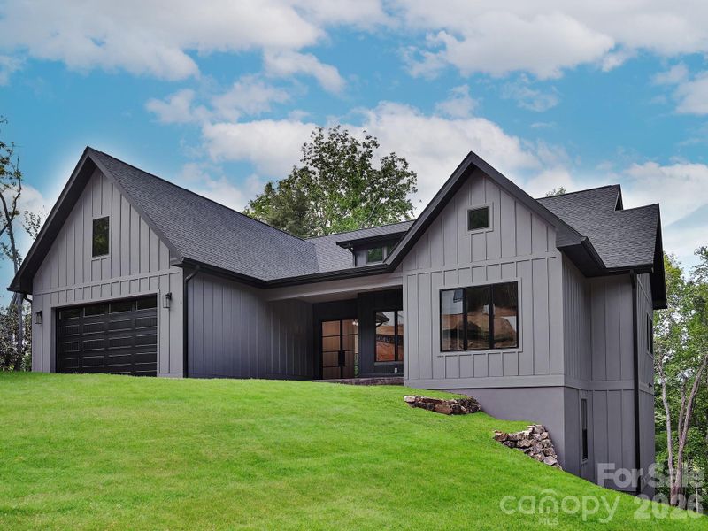 Front exterior of a new home in , Fairview, NC, highlighting curb appeal (Image 24).