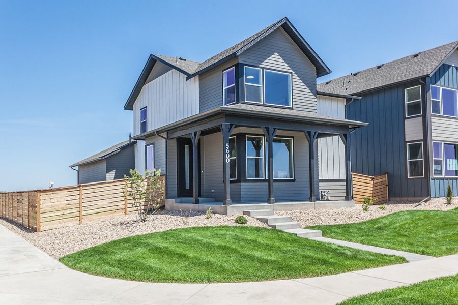 Front exterior of a new home in Trailside, Timnath, CO, highlighting curb appeal (Image 26).