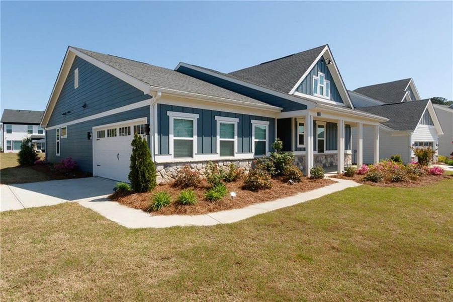 Front exterior of a new home in Sweetbay Farm, Lawrenceville, GA, highlighting curb appeal (Image 29).