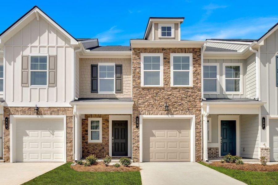 Front exterior of a new home in Village Green, Adairsville, GA, highlighting curb appeal (Image 1). Front exterior of a new home in Village Green, Adairsville, GA, highlighting curb appeal (Image 1).