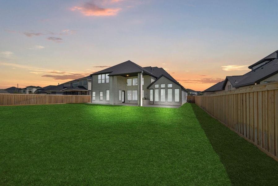 Exterior details and patio area of a home in Dunham Pointe, Cypress (Image 3).