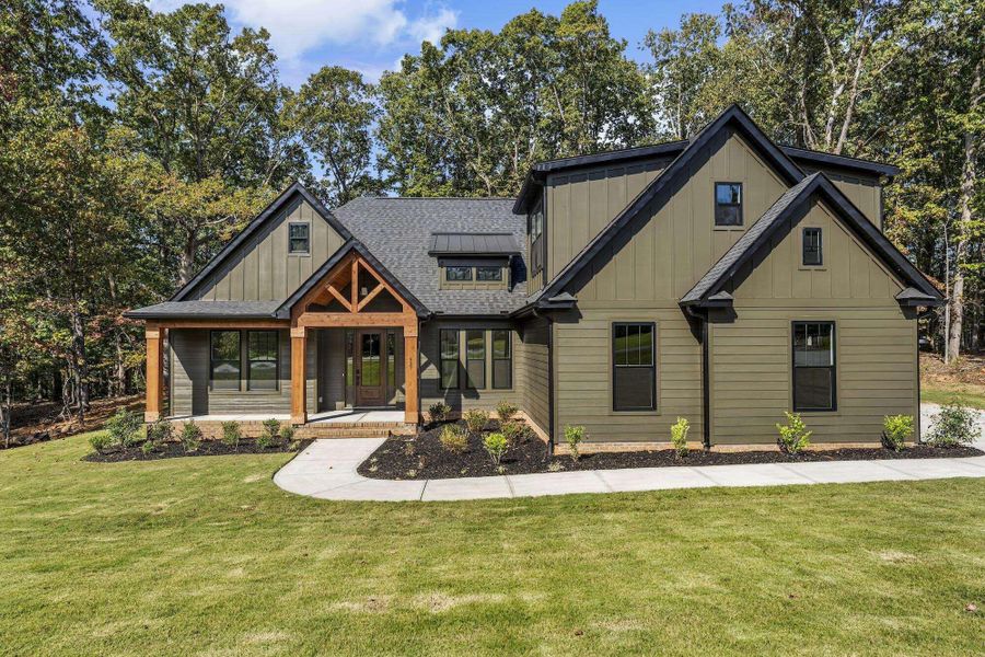 Front exterior of a new home in , Ridgeville, SC, highlighting curb appeal (Image 1). Front exterior of a new home in , Ridgeville, SC, highlighting curb appeal (Image 1).