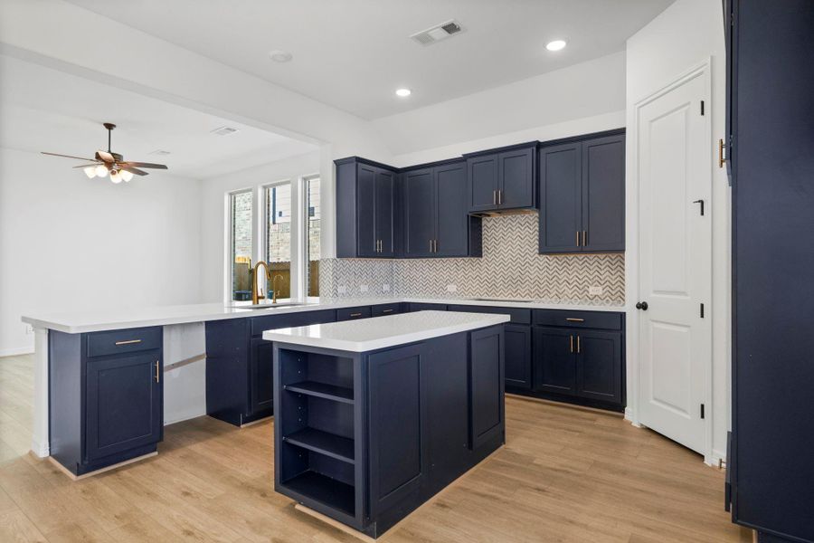This kitchen is not only a functional space but also has ample storage. Whether you're a seasoned chef or just love to gather and enjoy good food, this kitchen is a dream come true.