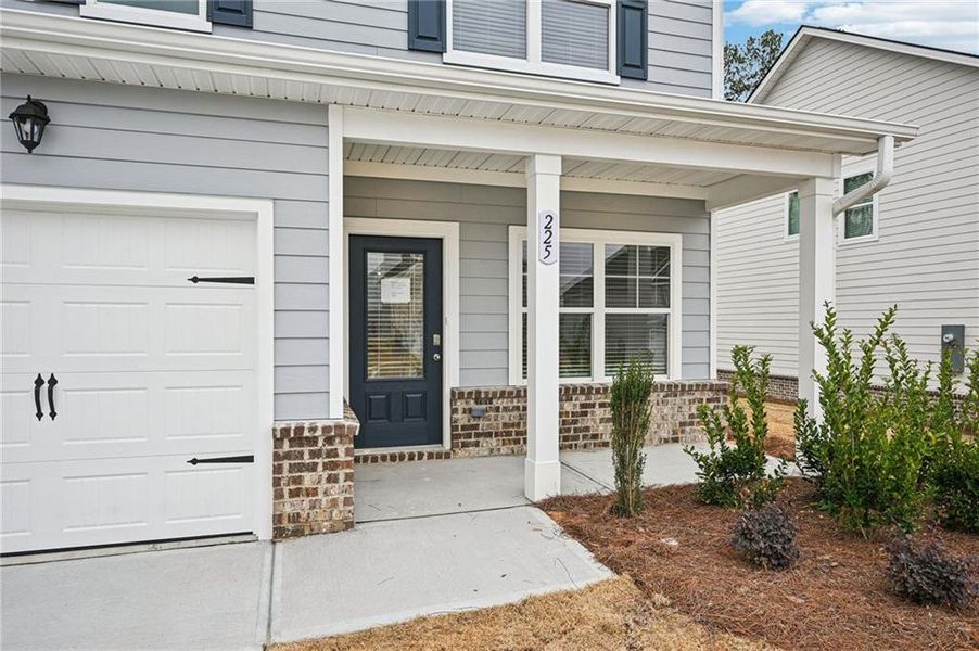 Exterior details and patio area of a home in The Hills at Cedar Creek, Winder (Image 3).