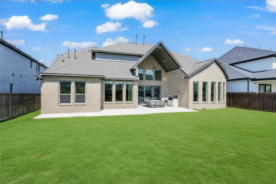 Exterior details and patio area of a home in Dunham Pointe, Cypress (Image 4).
