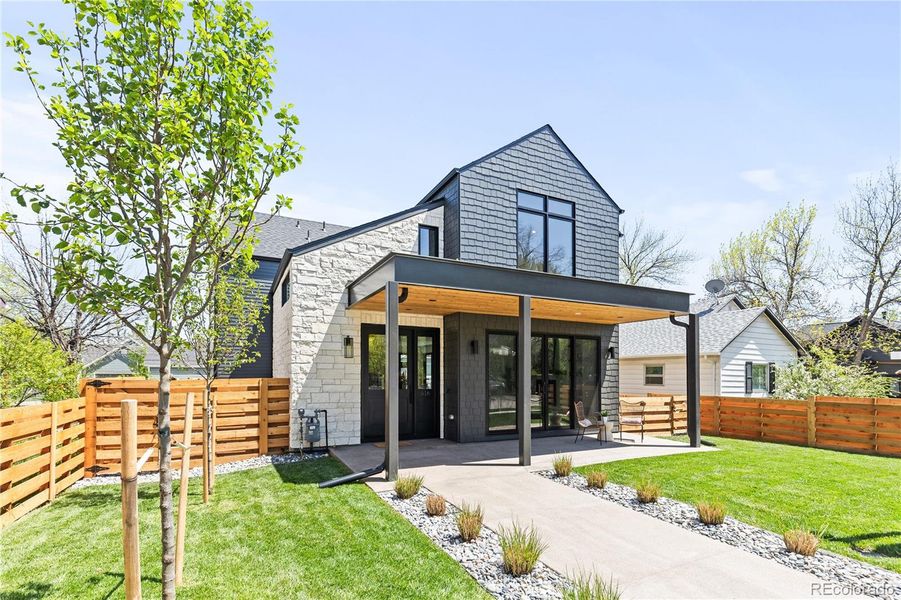 Front exterior of a new home in , Louisville, CO, highlighting curb appeal (Image 22).