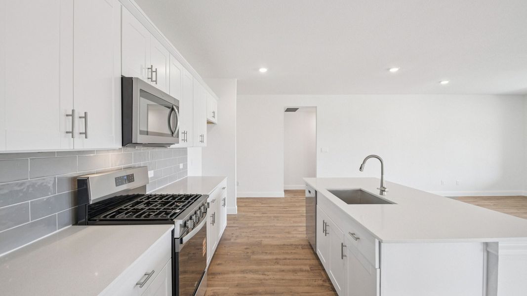 Furnished interior view inside a new home in Railhead, Cedar Creek (Image 8).
