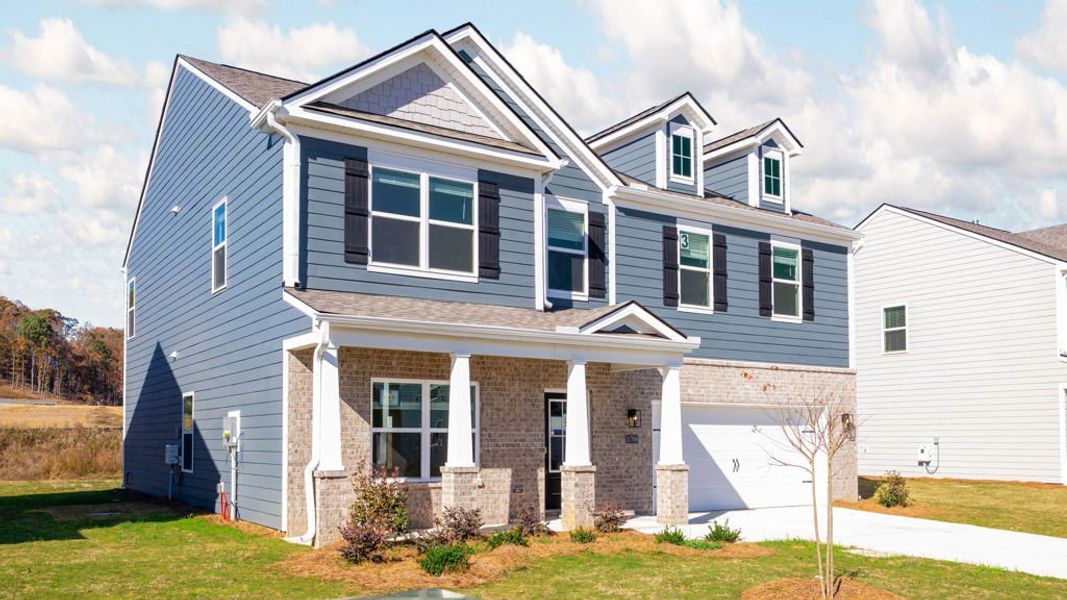 Front exterior of a new home in Prairie Pass, Apison, TN, highlighting curb appeal (Image 16).