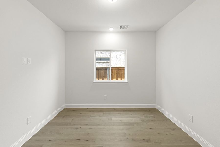 Spacious, unfurnished interior of a new home in The Reserve at Spiritas Ranch, Little Elm (Image 23).