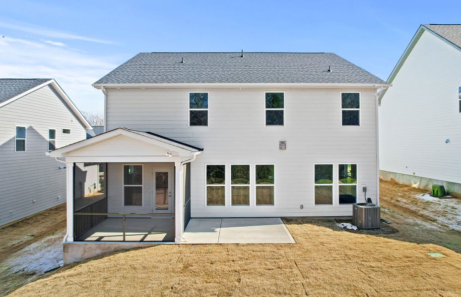 Exterior details and patio area of a home in Forest Creek, Waxhaw (Image 21).