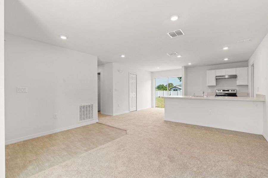 Representative unfurnished interior of a home built from the Phoenix by Holiday Builders in Poinciana, Poinciana (Image 11). Representative unfurnished interior of a home built from the Phoenix by Holiday Builders in Poinciana, Poinciana (Image 11).