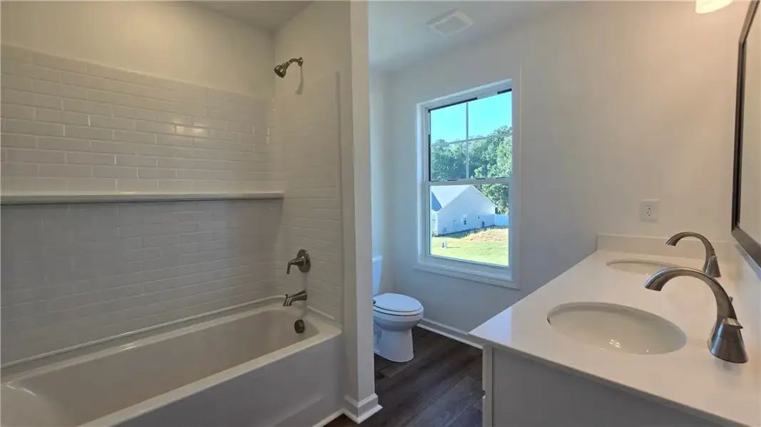 Clean lines define a well-appointed bathroom highl